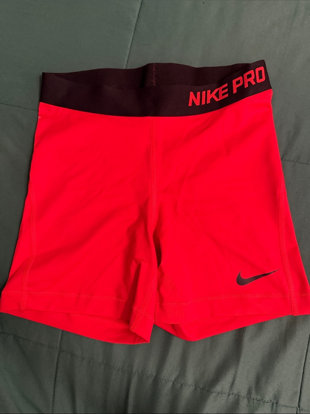 Nike Women's Red Athletic Bike Shorts with Black Waistband